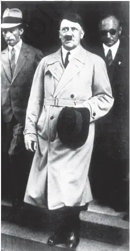 Hitler (centre) and Goebbels (left) leaving after an official meeting, 1932 - Nazism and the Rise of Hitler - Ebook NCERT