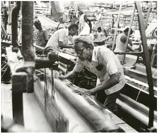 A factory, with several labourers and machines - NCERT Economics Class 9 Chapter 1 Organisation of Production Notes & PDF - E-book NCERT