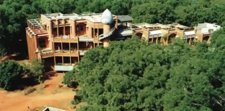 A community building in Auroville constructed by Auroville Earth Institute. This modern building is made of mud using special techniques. - E-book NCERT