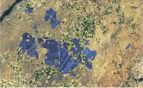 Satellite image of one of the largest solar parks in the world located in Rajasthan - Responsible and Wise Use of Natural Resources - Stewardship - E-book NCERT